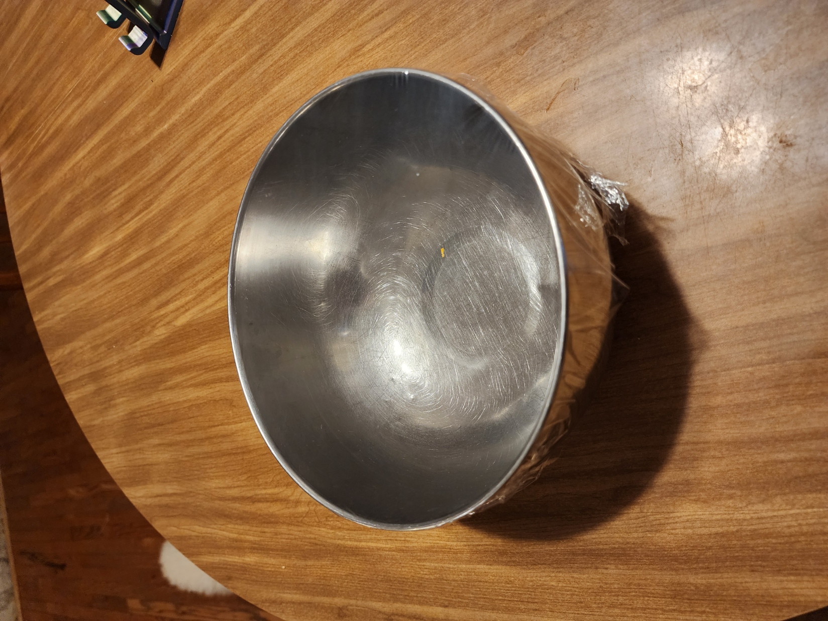 Bowl covered with plastic wrap