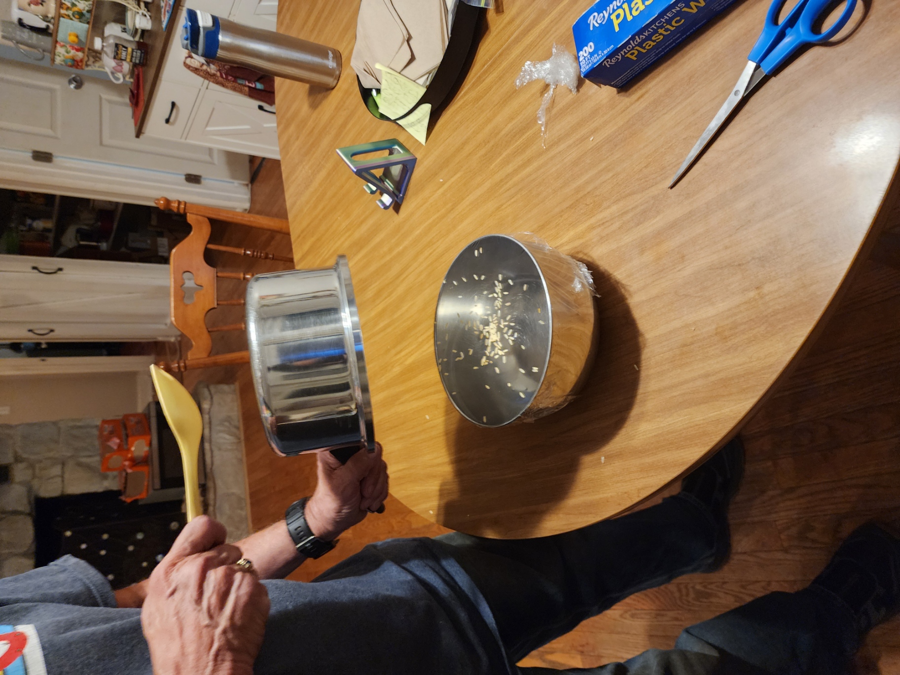 Pot positioned above bowl